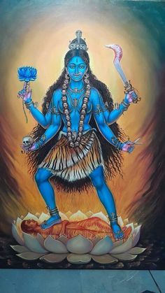 a painting of a person with blue paint on their body and arms, holding two flowers