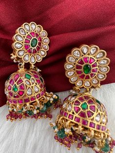 Jadau Kundan Jhumka Earrings Ceremonial Red Meenakari Jhumkas, Heavy Temple Jewelry Earrings For Celebration, Multicolor Temple Jewelry Earrings For Ceremonial Occasions, Round Latkan Temple Jewelry Earrings, Heavy Ruby Traditional Jhumkas, Traditional Ruby Jhumkas For Festivals, Traditional Ruby Jhumkas With Latkans, Temple Jewelry Style Round Latkans Earrings, Ceremonial Round Earrings With Latkans