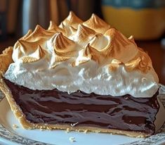 a piece of chocolate pie with whipped cream on top