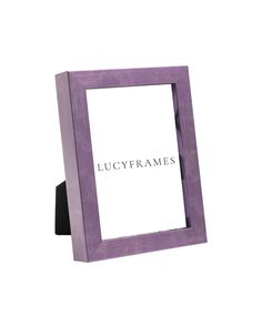 a purple wooden frame with the word lucyframes on it's side