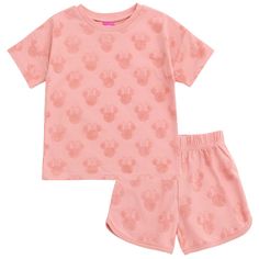 Get ready for a day filled with Disney magic in this adorable Minnie Mouse outfit! This stylish pink short sleeve tshirt and shorts set features a cute all-over print design of Minnie's classic mouse-ear icon that your little girl will love to wear! Made of a soft French Terry material that keeps your child comfortable, this fashionable Disney tee and dolphin shorts set is the perfect outfit for all day fun and adventure! Disney Outfits For Kids, Dolphin Shorts Outfit, Kids Disney Outfits, Disney With A Toddler, Minnie Mouse Outfits, Dolphin Shorts, Disney Toddler, Minnie Mouse Girl, Disneyland Outfits