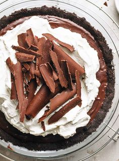 This classic (homemade!) chocolate cream pie recipe features an Oreo cookie crust, a chocolate pastry cream filling, and is topped with fresh whipped cream. This from-scratch version is bursting with rich chocolate flavor and is heads and tails better than the box pudding varieties.