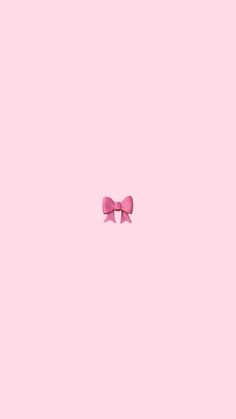 a pink bow on a pink background