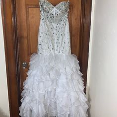 Selling A White Strapless Wedding Gown With Silver Sequins On The Upper Half Of The Dress And Ruffles On The Bottom Of The Dress. Just Needs Dry Cleaning. Strapless Wedding Gown, Silver Sequin, White Wedding Dresses, White Silver, Ruffles, Size 10, Wedding Gowns, Wedding Dresses, Womens Dresses