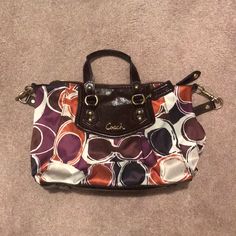 This Is An Authentic Coach Purse. Discontinued Color And Has Only Been Used One. Basically Brand New. It’s A Nice Sized Bag Can Fit A Good Amount Of Stuff In It. Come With A Strap That You Can Put Over Your Shoulder Or Take It Off And Use It As A Hand Purse. Coach Purple Bag With Adjustable Strap, Coach Purple Shoulder Bag With Adjustable Strap, Coach Purple Crossbody Shoulder Bag, Y2k Shoulder Bag, Hand Purse, Beige Purses, Coach Leather Bag, Oxblood Leather, Tote Outfit