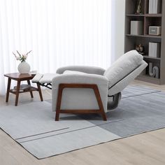 a living room scene with focus on the reclining chair and coffee table in the foreground