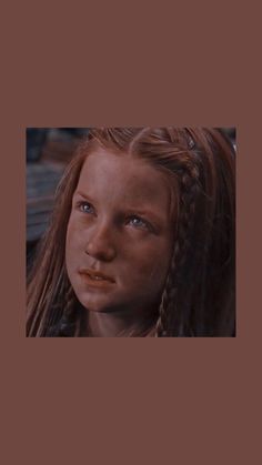 a woman with long hair and braids looking at the camera in star wars ii