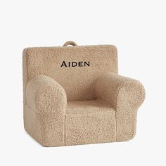 a teddy bear chair with the word'aiden'written in black on it