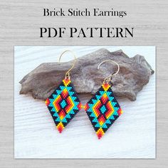 a pair of colorful earrings sitting on top of a piece of driftwood with text overlay that reads, brick stitch earrings pde pattern