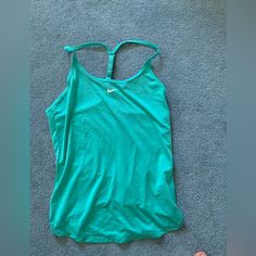 In Perfect Condition Never Worn. Wrinkly From Storage. Has Adjustable Strap In The Back. Super Cute Turquoise Color! Nike Summer Beach Top, Nike Green Sleeveless Top, Clothing Finds, Tops Nike, Cell Phone Holster, Walker Boots, Workout Tank Tops, Fit N Flare Dress, Turquoise Color