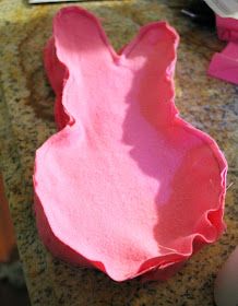 a pink paper plate sitting on top of a counter