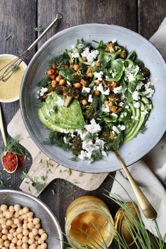 a salad with broccoli, chickpeas and feta cheese