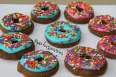 there are many donuts with sprinkles on them