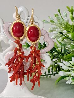 Long earrings with gold-plated 925 silver element with imitation red coral paste cabochon and cluster of natural Mediterranean red coral sprigs. Open lever clasp in gold-plated 925 silver total length 8.5 cm weight 7 grams each earring Coral Earrings Gold, Silver Element, Red Coral Earrings, Italian Jewelry, Coral Earrings, 925 Silver Earrings, Red Coral, Natural Red, Long Earrings