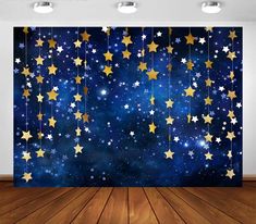 an image of a room with stars on the wall and wood flooring in front of it