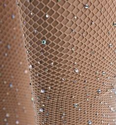 - Black fishnet pantyhose with rhinestone add a touch of sparkle to your outfit. - With a sexy fishnet design, these 100% nylon pantyhose have crystal-clear rhinestones lining the back seam. - 1 inch high pantyhose waist stretch belt finish - Stretch: one size fits most regular sizes - Recommended size: 5'2-5'9 and 90-170lb - Wear with an alluring costume or year-round! - Size & weight are approximate. May slightly different. Sparkly Fishnets, Rhinestone Fishnet Tights, Sparkly Tights, Beige Skin, Rhinestone Fishnets, White Fishnets, Diamond Party, Rose Boutique, Black Fishnets