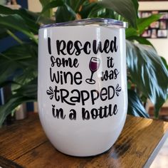 a wine glass that says, i rescued some it wine was trapped in a bottle