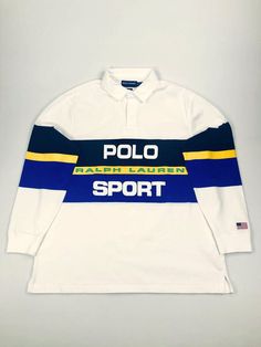 In soft cotton jersey, this rugby shirt combines bold color-blocking and an oversize Polo Sport logo for a throwback look.   DETAILS Classic Fit: our roomiest silhouette. Cut for a lower armhole and a fuller sleeve. Size medium has a 29½" body length (front and back), an 18¾" shoulder, a 45" chest, and a 35" sleeve length. Sleeve length is taken from the center back and changes 1" between sizes. Twill rugby collar. Three-button placket. Rubber buttons. Long sleeves with ribbed cuffs. Historical Balenciaga Shirt, Oversized Polo, Ralph Lauren Hoodie, Creative T Shirt Design, Swag Men, Polo Sport Ralph Lauren, Sport Logo, American Flag Print, Ralph Lauren Sport