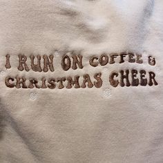 I Run On Coffee & Christmas Cheer Embroidered Crewneck Sweatshirt Made to order and embroidered by me! I can make the snow flakes and lettering whatever color youd like! Just leave a comment of which colors youd like :) Country Embroidered Sweatshirt, Embroidery Apparel, Purple Cactus, Coffee Christmas, Etsy Ideas, Frozen Inspired, Snow Flakes, Embroidery On Clothes, Embroidered Crewneck