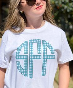 We are in love with this Gingham Monogram Shirt! 

GILDAN
Short Sleeve - 6.0 oz. pre-shrunk 100% cotton Summer Cotton Monogram Print Tops, Summer Cotton Tops With Monogram Print, Cotton Monogram T-shirt For Spring, Spring Cotton Monogram T-shirt, White Monogrammed Short Sleeve Top, White Monogram Short Sleeve Top, Spring Cotton Monogram Print Tops, Spring Cotton Tops With Monogram Print, Short Sleeve Cotton Monogram Top