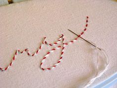 a close up of a piece of cloth with yarn on it