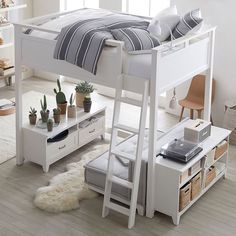 a white bunk bed sitting on top of a wooden floor