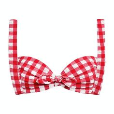 a red and white checkered bow tie on top of a headband with no hair