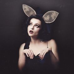 a woman with bunny ears on her head