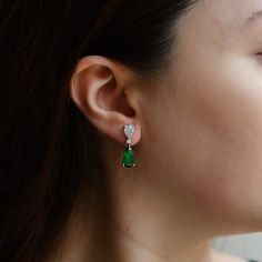 Vibrant and elegant, the Love and Commitment Belcanto Earrings by Ruchi New York are the perfect complement to any sophisticated outfit. These drop earrings feature stunning pear-shaped emeralds that suspend from equally exquisite pear-shaped diamonds, creating a striking contrast that will turn heads. The emeralds weigh a total of 4.05 carats and are perfectly complemented by the 2.23 carats of diamonds, which add the right amount of sparkle to these stunning earrings.Ruchi New York's Love & Co Love And Co, Pear Shaped Diamond, Stunning Earrings, White Stone, Fashion Advice, Pear Shaped, Precious Metals, Timeless Beauty, Diamond Earrings