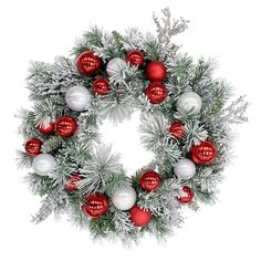 a christmas wreath with red and white ornaments hanging from it's sides, on a white background