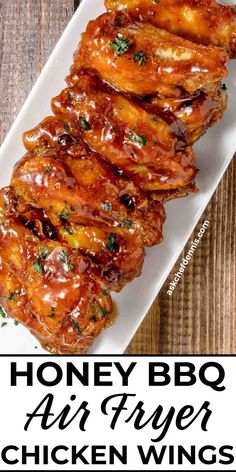 honey bbq air fryer chicken wings on a white plate with text overlay