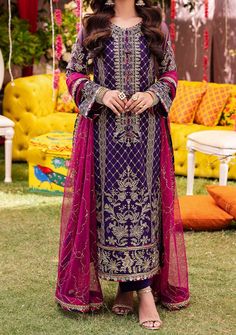 Introducing our New collection 'JAG MAG' by Asim Jofa designed to make you look and feel your best. Asim Jofa’s “Jag Mag Collection” unveils this purple outfit which celebrates the richness of desi festivities. Draped in royal purple, this outfit boasts a neckline lavishly embroidered with antique gold and gold zariwork complemented by 3mm gold sequins. The rhythmic embroidery flows across the shirt creating contemporary motifs that make this piece truly luminous. Paired with an embroidered pink dupatta, this ensemble is a testament to the vibrant spirit of celebration. Embroidered Front Center Panel On Net. Embroidered Side Panel Right and Left On Net. Embroidered Border For Front Daman On Net. Embroidered Back With Border On Net. Embroidered Sleeves With Border On Net. Embroidered Border Elegant Purple Salwar Kameez For Eid, Designer Purple Unstitched Suit With Resham Embroidery, Festive Purple Unstitched Suit With Resham Embroidery, Festive Purple Set With Intricate Embroidery, Festive Purple Sets With Intricate Embroidery, Designer Purple Salwar Kameez With Resham Embroidery, Elegant Purple Kurta For Eid, Designer Purple Unstitched Suit With Intricate Embroidery, Elegant Festive Purple Kurta