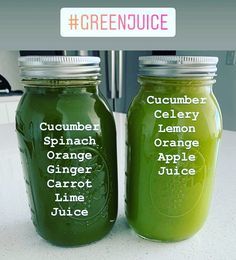 two green jars with labels on them sitting on a counter top next to each other