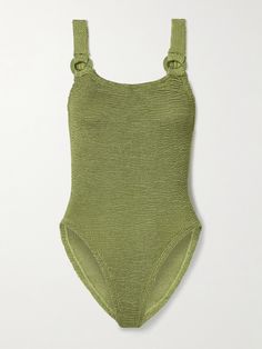 Like all of Hunza G's designs, this 'Domino' swimsuit is both classic and comfortable - you're bound to wear it for years to come. It's made from the brand's supportive 'Crinkle™' seersucker that flexes to complement a range of body shapes, and has a scooped neckline suspended by fabric-covered rings at the straps. The metallic leaf-green shade shimmers beautifully in sunlight. Textured One-piece Swimwear, Textured Sleeveless Swimwear For Vacation, Textured Green Swimwear For Summer, Green Textured Swimwear For Summer, Textured Green Beachwear Swimwear, Textured Green Swimwear For Vacation, Fitted Textured Green Swimwear, Green Textured Fitted Swimwear, Dream Boutique