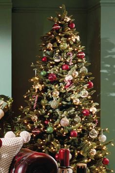 a decorated christmas tree in a living room