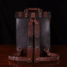 The refined styling of this ruggedly handsome leather laptop backpack makes it the perfect choice for all your business and professional needs. Rugged Backpack With Leather Handles, Rugged Travel Briefcase With Leather Lining, Rugged Leather Backpack With Waxed Finish, Rugged Waxed Satchel Briefcase, Luxury Rugged Leather Briefcase, Buffalo Bison, American Buffalo, Bison Leather, Leather Laptop Backpack