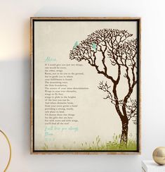 a framed poster with a tree and poem on it