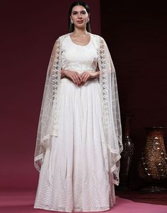 Radiate pure elegance in White Pure Viscose Georgette Anarkali Choli! 🌟✨ This ensemble captures timeless beauty and grace. Perfect for embracing the charm of special occasions. Get ready to steal the spotlight with your stunning presence and create unforgettable memories! 💃 #ArabicAttireWhiteElegance #AnarkaliCholi #TimelessCharm A Line Lehenga, White Dupatta, Lehenga Dupatta, Georgette Anarkali, White Elegance, Georgette Dupatta, Chaniya Choli, Net Dupatta, Viscose Rayon