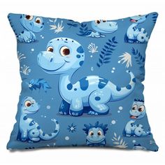 a blue pillow with an image of a dinosaur and other cartoon animals on the front