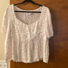 Size Xl, Cream With Little Orange-Ish Flowers. Elastic On Sleeves. New Without Tags! Cotton Ditsy Floral Print Top For Day Out, Orange Flowy Top For Summer, Flowy Orange Summer Top, Casual White Tops With Ditsy Floral Print, Cute Tops With Ditsy Floral Print For Day Out, Casual White Top With Ditsy Floral Print, White Ditsy Floral Print Short Sleeve Top, White Ditsy Floral Print Summer Top, White Cotton Top With Ditsy Floral Print