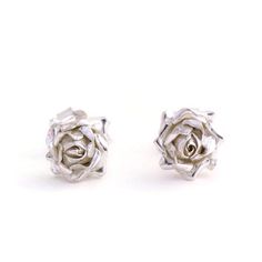 Rose Earrings, Sterling Silver Studs, Flower Earrings Individually handmade rose stud earrings with a small open rose design, a classic design for your be love . * Material: Sterling Silver * Size of Rose: Approx 1 cm (0.4in) diameter * Earring Type: Stud Earrings with butterfly back * Ready to Ship in 2-3 business day * Made in the United Kingdom PACKAGING: Comes uniquely packaged in my Magnolia Restrepo Style Case as shown in the last photo. Additional, I gift wrap all my boxes with golden pap Silver Rose Design Jewelry For Wedding, Silver Wedding Jewelry With Rose Design, Silver Earrings With Rose Design For Formal Events, Silver Rose Design Earrings For Formal Occasions, Formal Rose Earrings With Rose Design, Formal Silver Earrings With Rose Design, Formal Rose-design Rose Earrings, Rose Flower Earrings For Formal Occasions, Sterling Silver Flower Earrings For Wedding