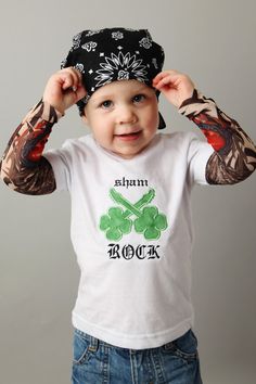 This tattoo sleeve shirt is perfect for your little rockstar to celebrate St Patricks Day in style! This hip, cute and comfy shirt features a ShamROCK. Sleeve Tattoos Ideas, Shamrock Tattoo, Shamrock Tattoos, Cool Clothes, Fake Baby, Tattoo Sleeves