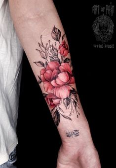 a person with a flower tattoo on their arm