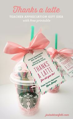 two starbucks coffee cups with pink bows and thank you notes on the top, one is for teacher appreciation gift idea