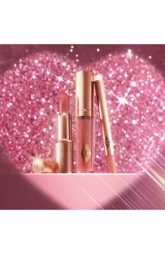 What it is: A limited-edition set of three iconic Charlotte Tilbury products for that Pillow Talk lip look.Set includes:- Travel-size Lip Cheat Lip Liner in Pillow Talk (0.02 oz.): a rich, velvety liner with the power to reshape, resize and balance your lips- Travel-size Matte Revolution Lipstick in Pillow Talk Original (0.05 oz.): a magical, matte lipstick with a long-lasting, buildable, hydrating formula featuring 3D glow pigments to create lips that appear wider and fuller- Collagen Lip Bath Charlotte Tilbury Products, Revolution Lipstick, Charlotte Tilbury Pillow Talk, Skincare Company, Lip Enhancement, Power Of Makeup, Lip Set, Makeup Tricks, Lip Kit