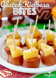 small appetizers with pineapple toppings on a white plate at a party