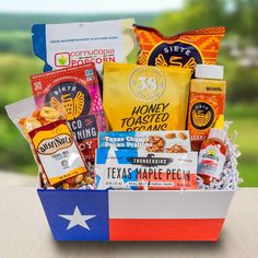 a basket filled with snacks sitting on top of a table