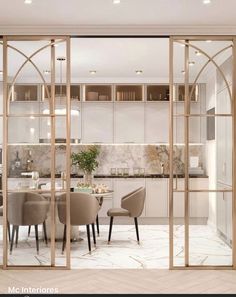 an open glass door leading to a dining room and kitchen area with marble flooring