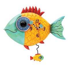 a clock with a fish on it's face and numbers painted on the side