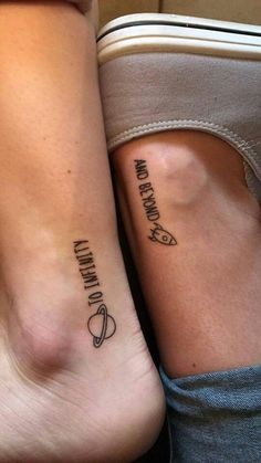 two people with matching tattoos on their legs, one has the word love and the other is